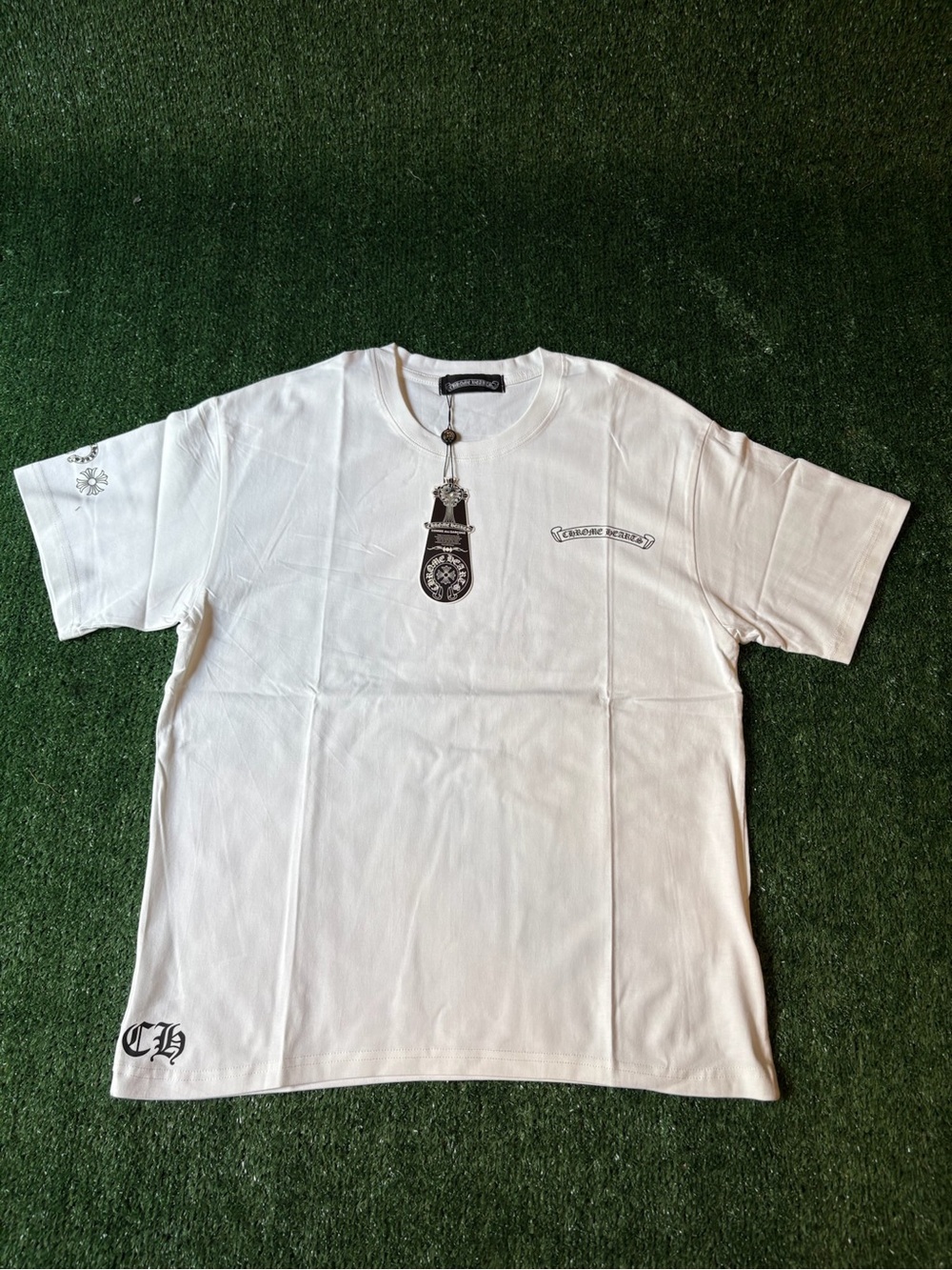 White Short Sleeve Graphic Tee with Black Emblems